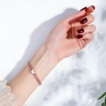 Lắc Tay Nữ Bướm Trắng Titan Ko Đen TT 2537